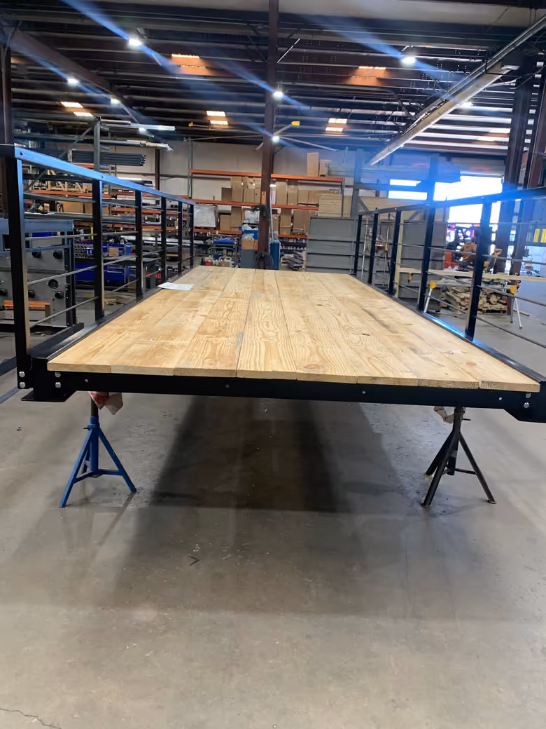 An eight by twenty foot bolt-together bridge kit, powder coated with timber decking.