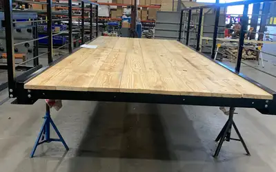 An eight foot by twenty foot bolt-together bridge kit, powder coated with timber decking fitted.