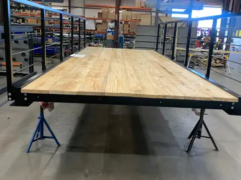 An eight foot by twenty foot bolt-together bridge kit, powder coated with timber decking fitted.