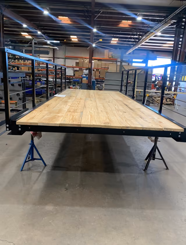 An eight foot by twenty foot bolt-together bridge kit, powder coated with timber decking fitted.