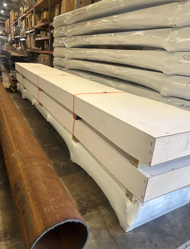 A bolt-together bridge kit stacked and banded flat for shipping.